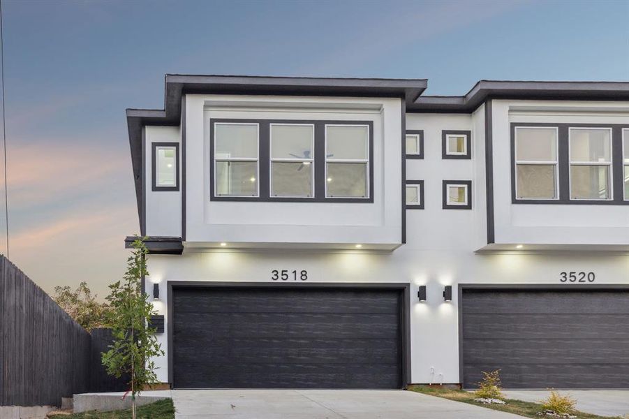 View of front of property with a garage