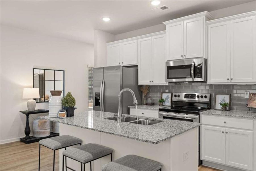 Furnished interior view inside a new home in Rivershire Place, Villa Rica (Image 25).