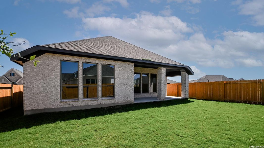 Exterior details and patio area of a home in Meadows of Mill Creek, Seguin (Image 22).