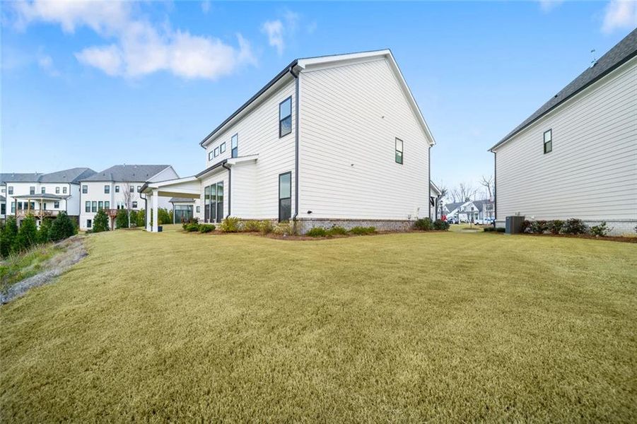 Exterior details and patio area of a home in , Buford (Image 27). Exterior details and patio area of a home in , Buford (Image 27).
