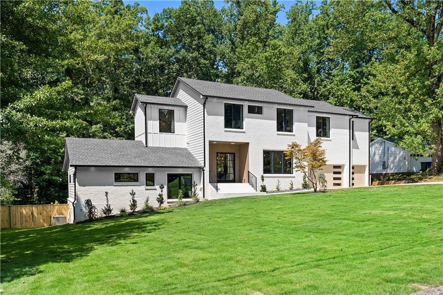 Front exterior of a new home in , Atlanta, GA, highlighting curb appeal (Image 33). Front exterior of a new home in , Atlanta, GA, highlighting curb appeal (Image 33).