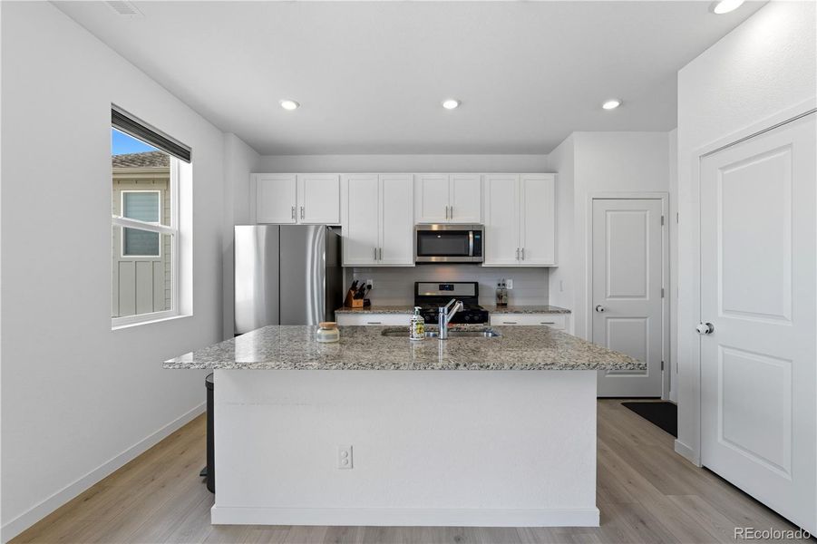 Furnished interior view inside a new home in Ascent Village at Sterling Ranch - Single Family Homes, Littleton (Image 25). Furnished interior view inside a new home in Ascent Village at Sterling Ranch - Single Family Homes, Littleton (Image 25).