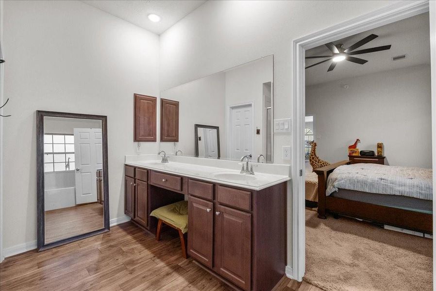 The private en-suite bath features a walk-in shower, soaking tub, double sinks and a walk-in closet The private en-suite bath features a walk-in shower, soaking tub, double sinks and a walk-in closet