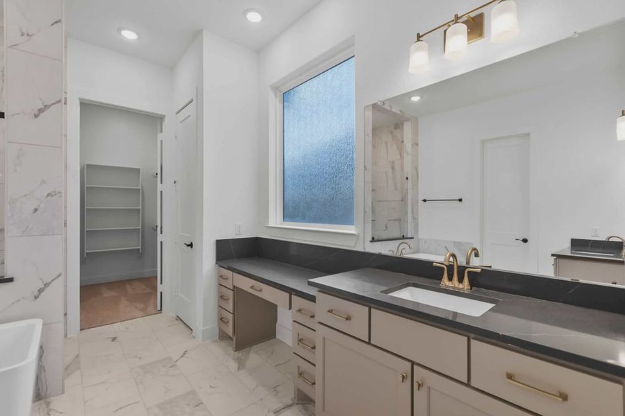Representative furnished interior of a home built from the Nicklaus by Chesmar Homes in Riceland Alley Loads, Mont Belvieu (Image 16).