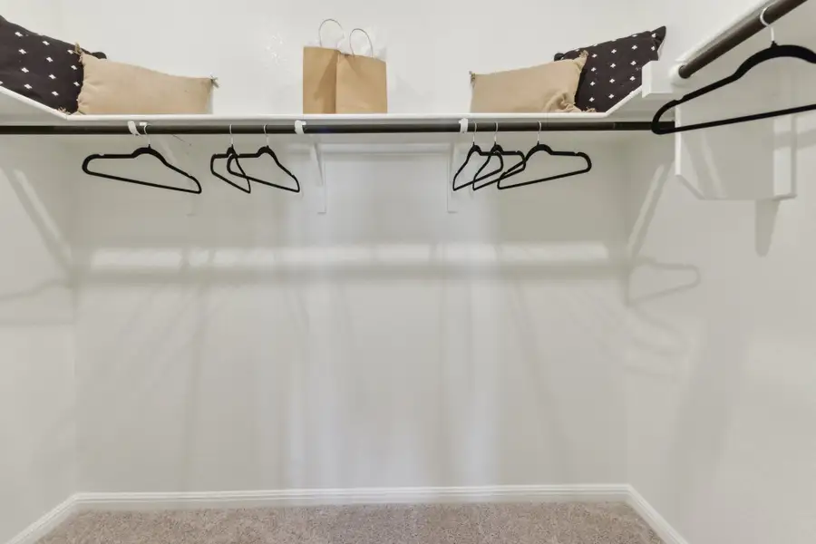 A white table with glasses. A white table with glasses.
