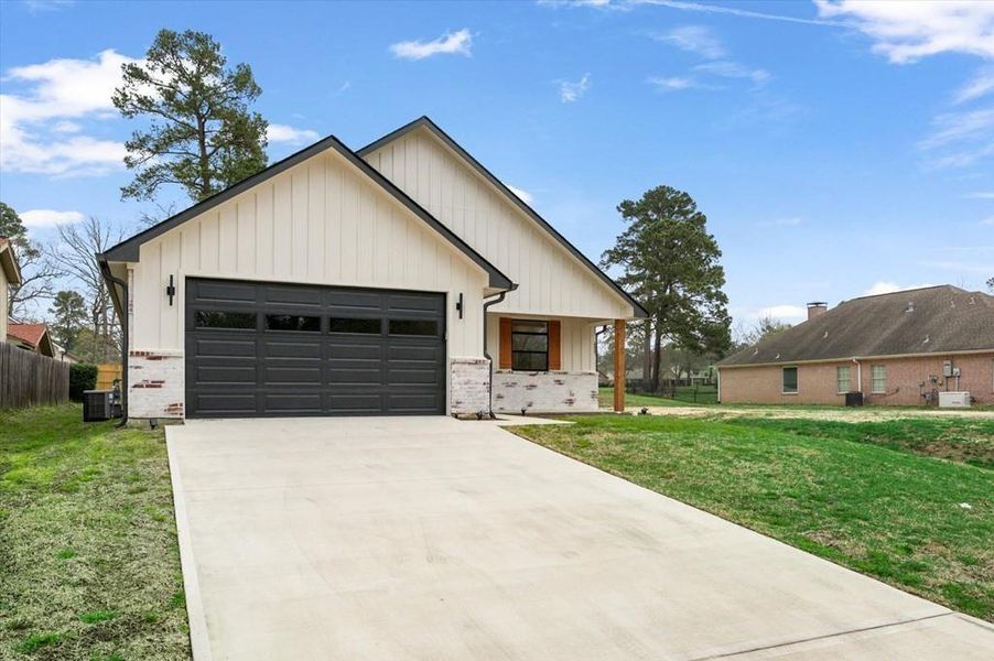 Front exterior of a new home in , Lufkin, TX, highlighting curb appeal (Image 29). Front exterior of a new home in , Lufkin, TX, highlighting curb appeal (Image 29).