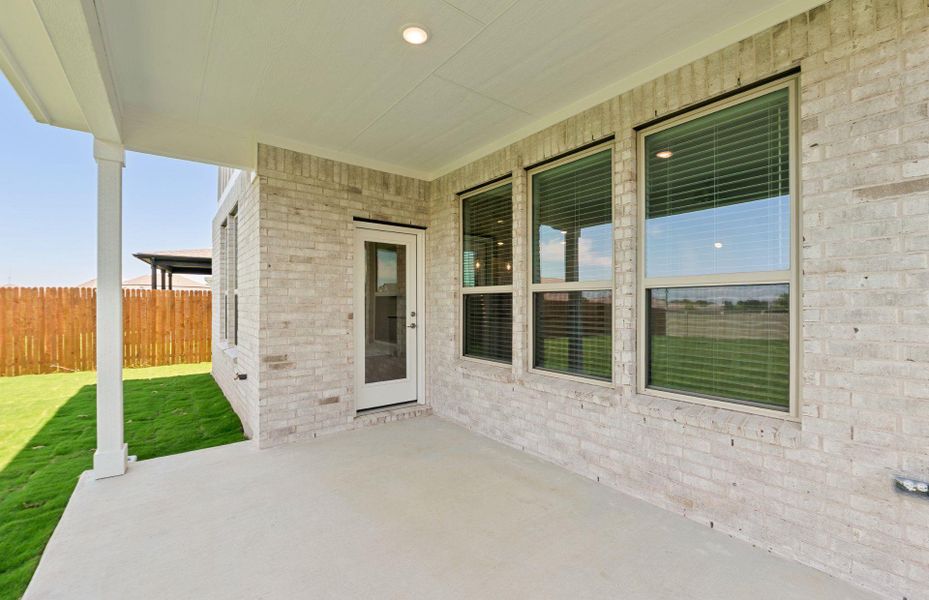Exterior details and patio area of a home in Santa Rita Ranch, Liberty Hill (Image 3).