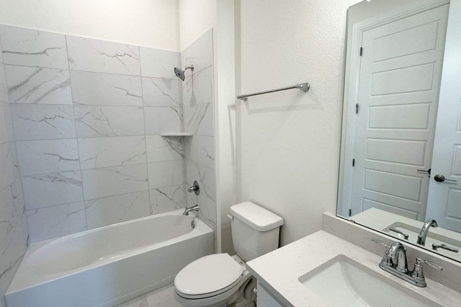 Furnished interior view inside a new home in Bluffview Reserve, Leander (Image 14).