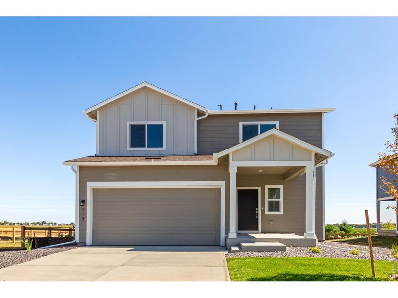 Front exterior of a new home in Granary, Johnstown, CO, highlighting curb appeal (Image 18).