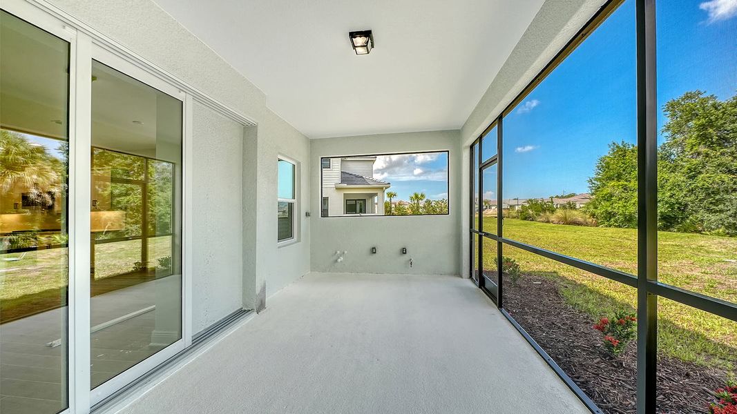 Exterior details and patio area of a home in Grand Park Real Estate and Homes for Sale in Sarasota, FL - Neal Communities, Sarasota (Image 27).