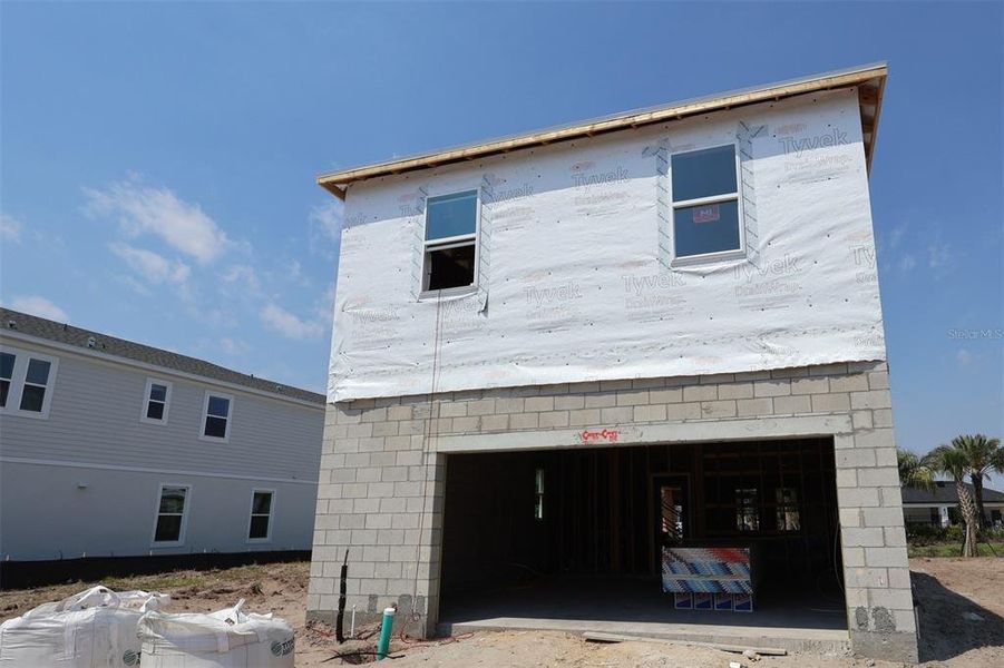 In-progress construction of a new home in Center Lake on the Park, St. Cloud, FL (Image 8).