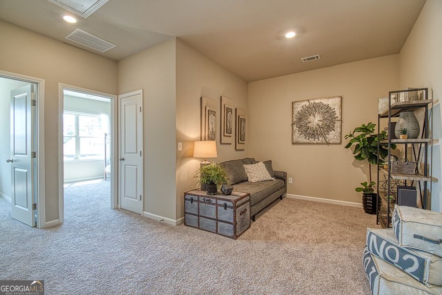 Furnished interior view inside a new home in Millstone at Mundy Mill, Gainesville (Image 11). Furnished interior view inside a new home in Millstone at Mundy Mill, Gainesville (Image 11).