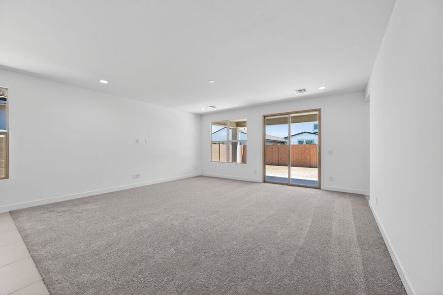Spacious, unfurnished interior of a new home in Artisan at Asante, Surprise (Image 13).