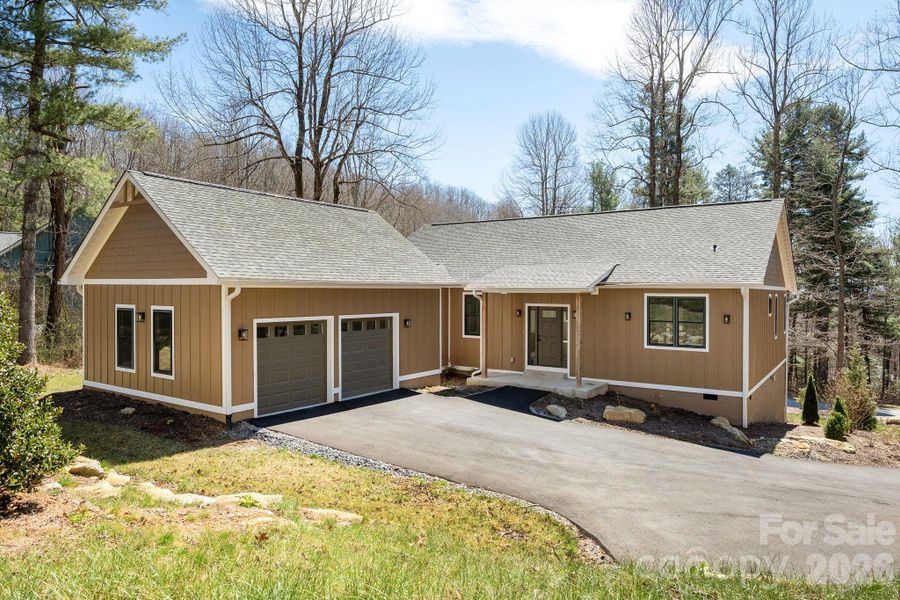 Front exterior of a new home in , Flat Rock, NC, highlighting curb appeal (Image 25).