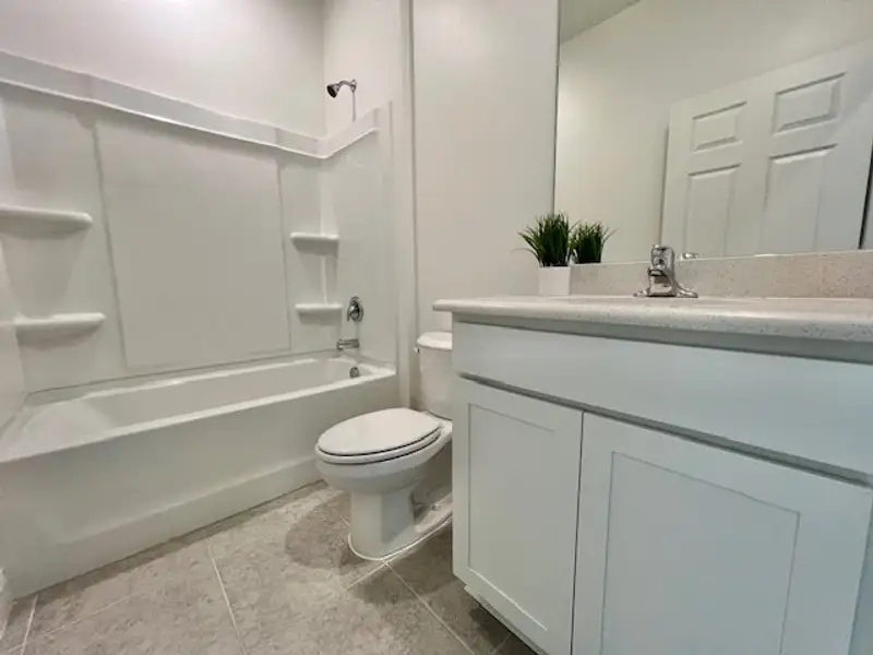 Furnished interior view inside a new home in Lakes At St Sebastian, Micco (Image 7).