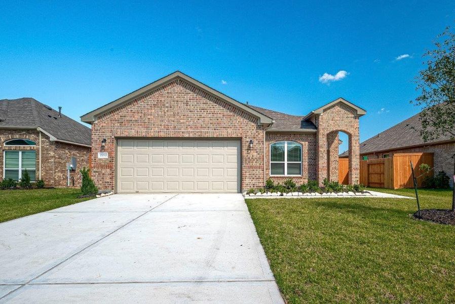 Front exterior of a new home in Cypress Green, Hockley, TX, highlighting curb appeal (Image 24).
