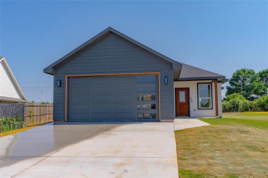 View of front of home with a front lawn