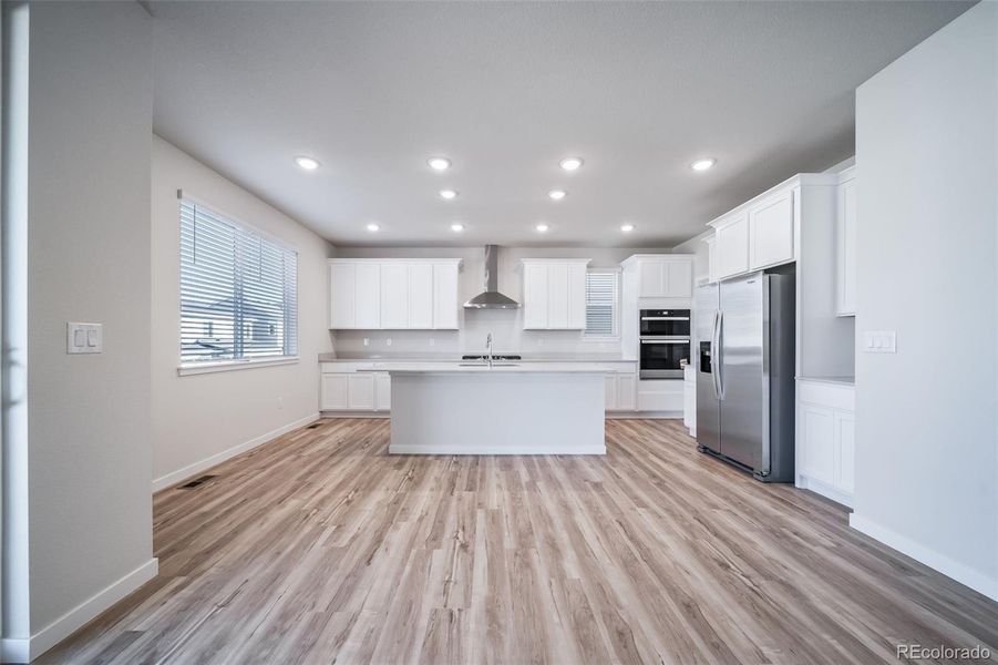 Spacious, unfurnished interior of a new home in Floret Collection at Alder Creek, Parker (Image 31).