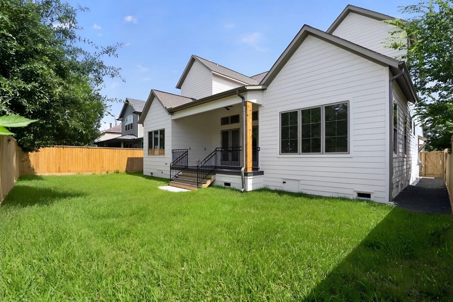 Exterior details and patio area of a home in , Houston (Image 26).