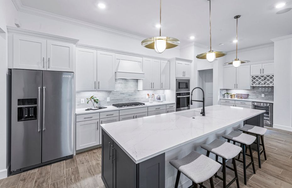 Open concept kitchen with stainless steel appliances Open concept kitchen with stainless steel appliances