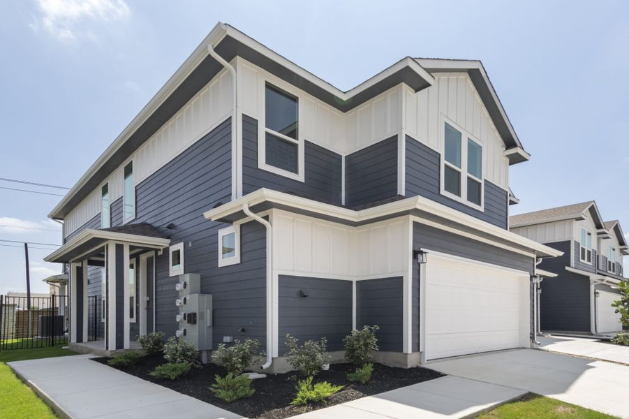 Front exterior of a new home in Center 45, Round Rock, TX, highlighting curb appeal (Image 18).