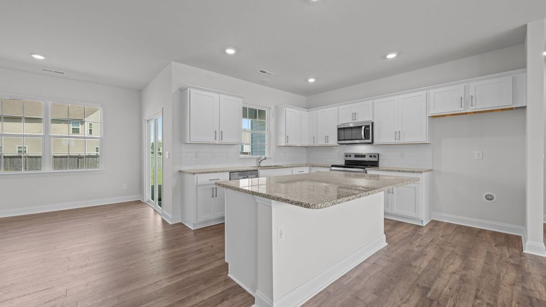 Furnished interior view inside a new home in Tyler - Home on the Lake, New Bern (Image 4).