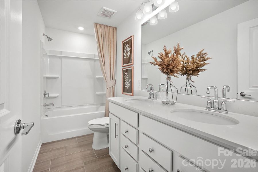 Furnished interior view inside a new home in Riverstone, Monroe (Image 26).