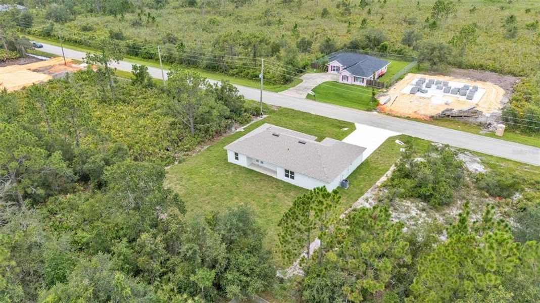 Front exterior of a new home in , Sebring, FL, highlighting curb appeal (Image 29).