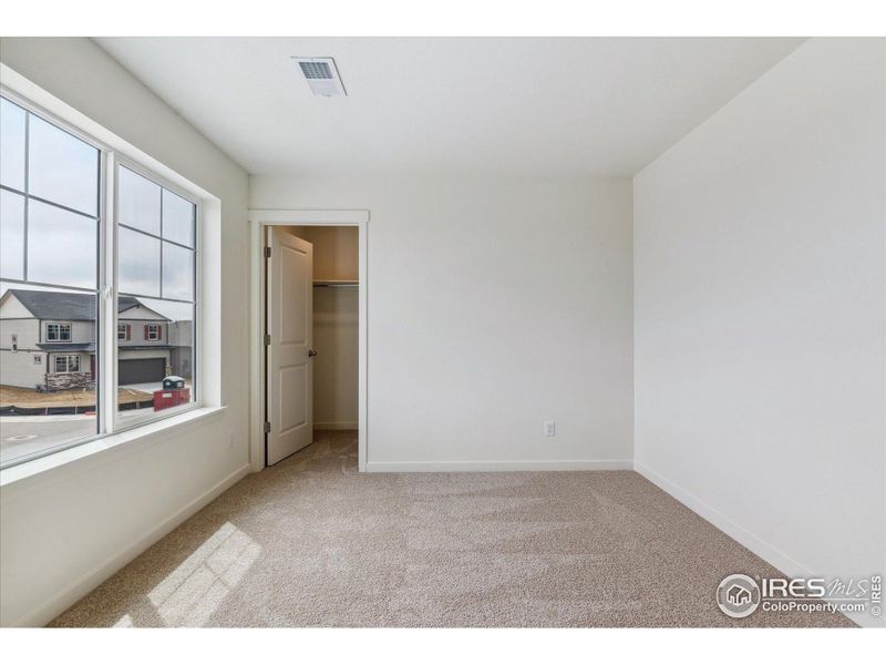 Spacious, unfurnished interior of a new home in Silver Peaks, Lochbuie (Image 10).