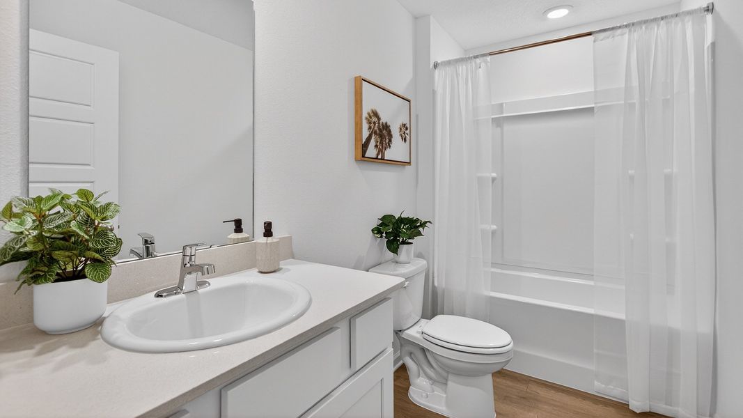 Representative furnished interior of a home built from the Baxter by D.R. Horton in Liberty Cove, Yulee (Image 21).