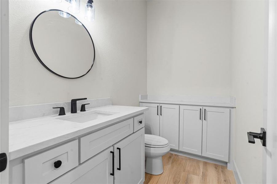 Bathroom with vanity and light wood-style floors Bathroom with vanity and light wood-style floors