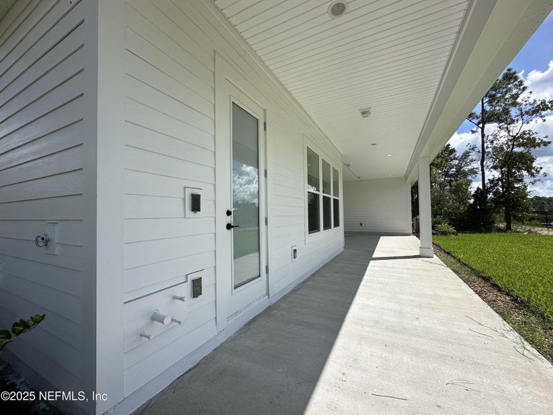 Exterior details and patio area of a home in SilverLeaf, St. Augustine (Image 4).