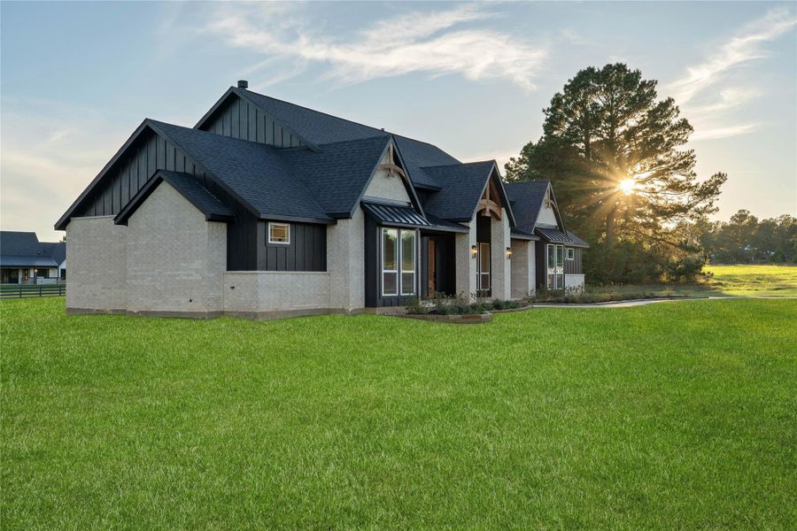 Front exterior of a new home in , Montgomery, TX, highlighting curb appeal (Image 2). Front exterior of a new home in , Montgomery, TX, highlighting curb appeal (Image 2).