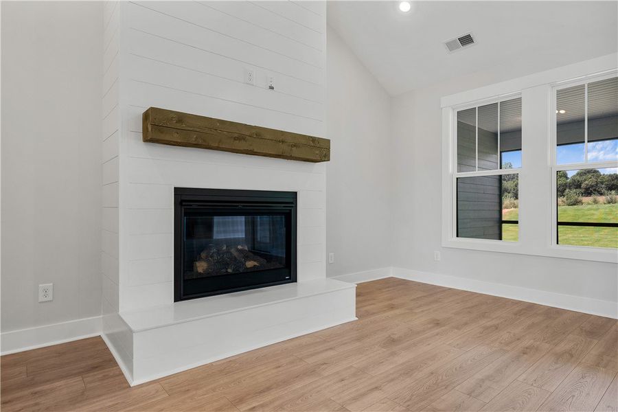 A striking fireplace with a shiplap surround ancho A striking fireplace with a shiplap surround ancho