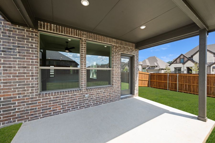 Exterior details and patio area of a home in Mockingbird Hills - Signature Series, Joshua (Image 3). Exterior details and patio area of a home in Mockingbird Hills - Signature Series, Joshua (Image 3).