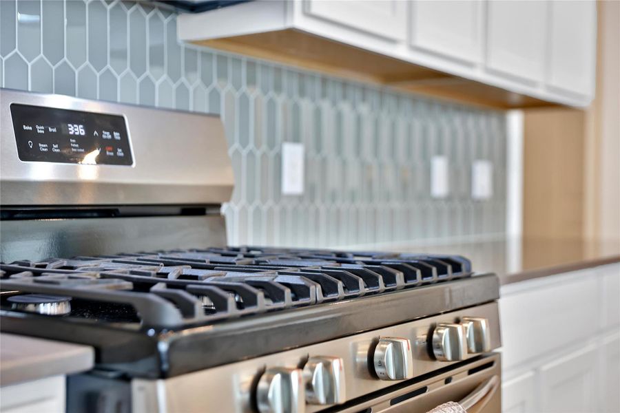Name brand appliances accompany the kitchen