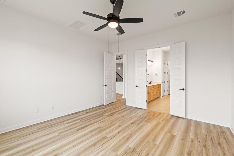 Spacious, unfurnished interior of a new home in Heritage, Dripping Springs (Image 21).