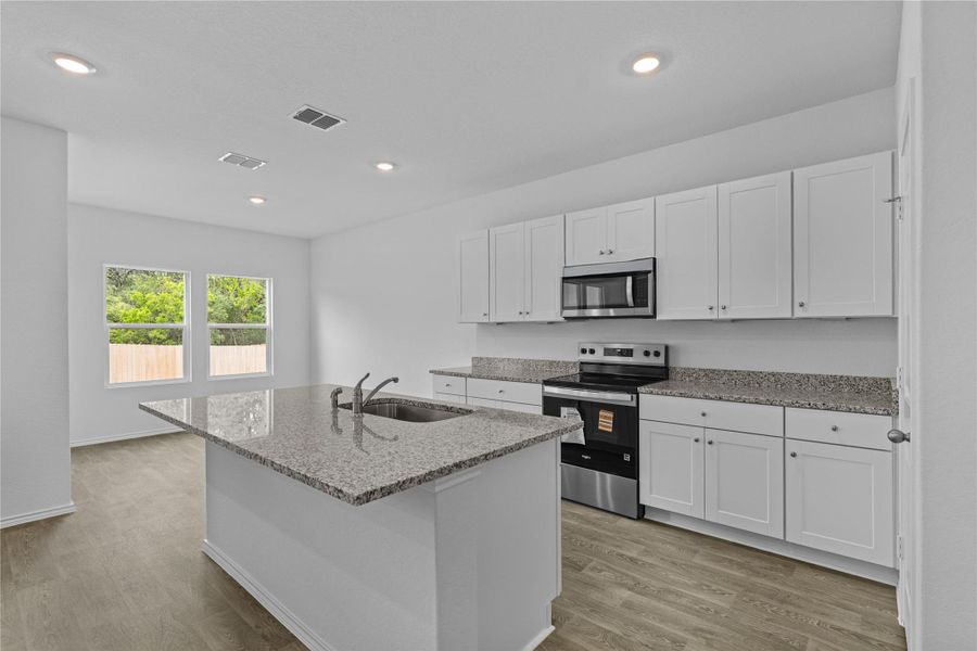 Furnished interior view inside a new home in Arroyo Ranch, Seguin (Image 7).