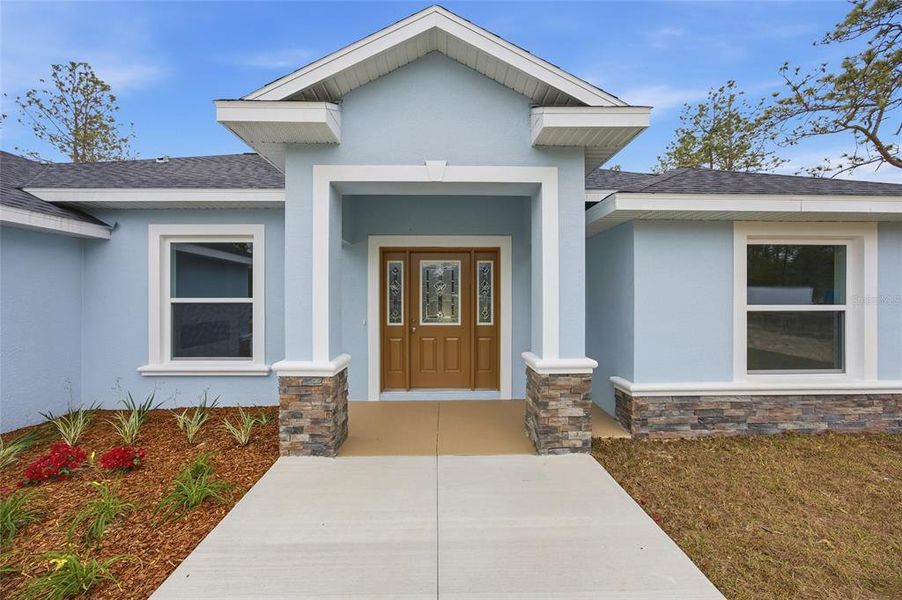 Front exterior of a new home in , Ocala, FL, highlighting curb appeal (Image 18).