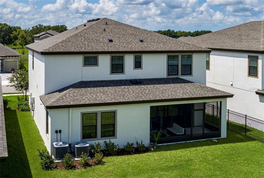 Exterior details and patio area of a home in Crosswind Point, Parrish (Image 29).