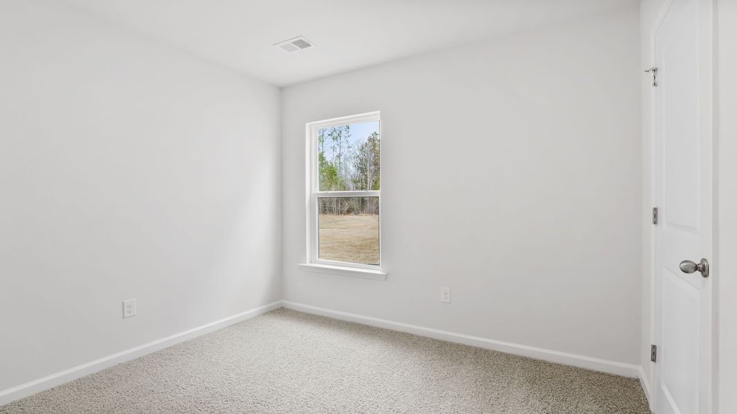 Spacious, unfurnished interior of a new home in Bentley Park, Greenwood (Image 15).
