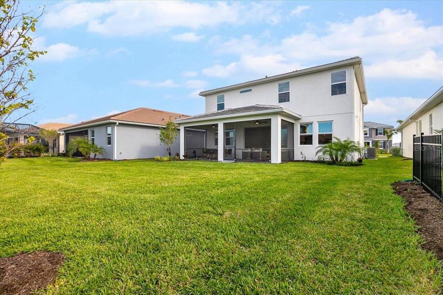 Front exterior of a new home in Sunstone at Wellen Park, Venice, FL, highlighting curb appeal (Image 1).