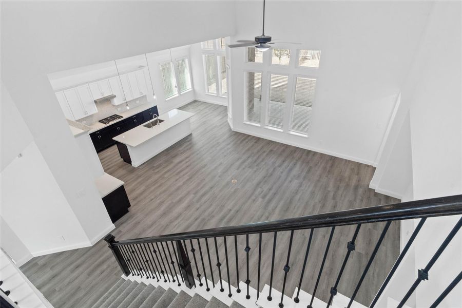 A phenomenal view from the second story, capturing the seamless flow between levels and an abundance of natural light.