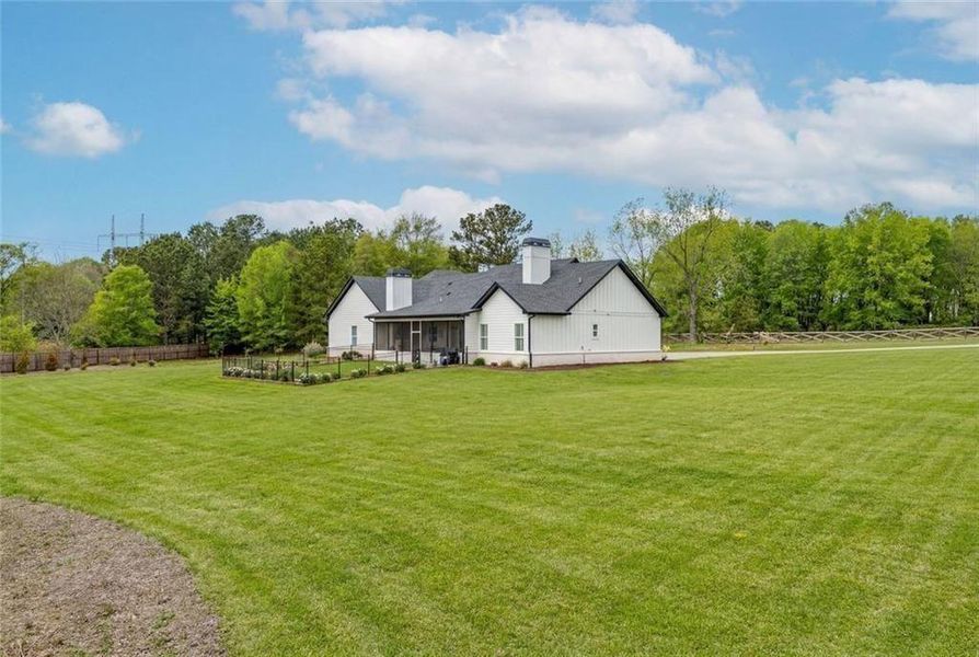 Front exterior of a new home in , Bethlehem, GA, highlighting curb appeal (Image 20).
