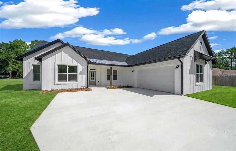 Front exterior of a new home in , Ocala, FL, highlighting curb appeal (Image 29). Front exterior of a new home in , Ocala, FL, highlighting curb appeal (Image 29).