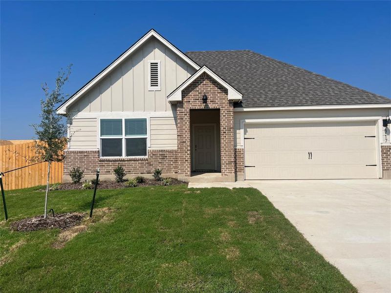 Front exterior of a new home in Park Meadows, Lorena, TX, highlighting curb appeal (Image 2).