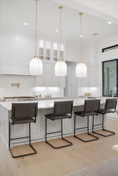 The kitchen is destined to hold the best parts of life — coffee before the house wakes up, family gathered around the island, holiday meals, laughter, and conversations that run long.