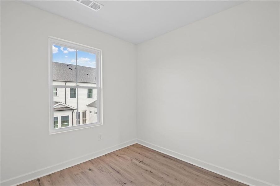 Spacious, unfurnished interior of a new home in The Village at River Green, Canton (Image 34).