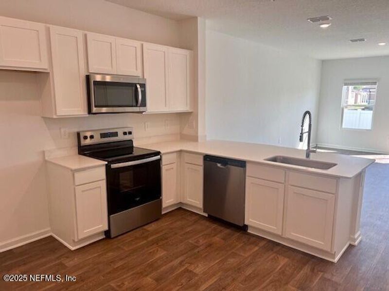 Furnished interior view inside a new home in Corsair, Middleburg (Image 8).