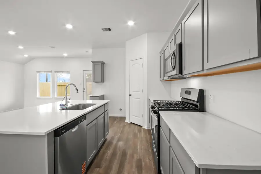 Furnished interior view inside a new home in Grand Pines, Magnolia (Image 6). Furnished interior view inside a new home in Grand Pines, Magnolia (Image 6).